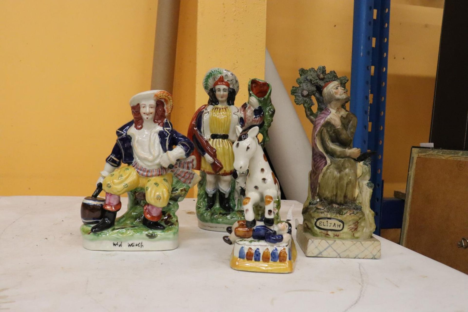 FOUR STAFFORDSHIRE FIGURES