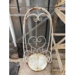 A DECORATIVE METAL SWING SEAT WITH HANGING CHAIN