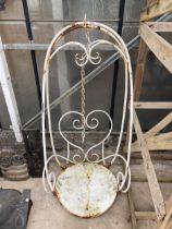 A DECORATIVE METAL SWING SEAT WITH HANGING CHAIN