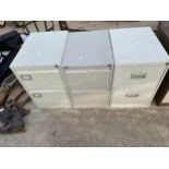 THREE METAL TWO DRAWER FILING CABINETS