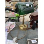 A VINTAGE BRASS BANKERS LAMP WITH GREEN GLASS SHADE