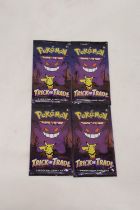 FOUR PACKETS OF POKEMON TRICK OR TRADE CARDS
