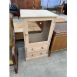 A MODERN PINE CABINET WITH TWO DRAWERS TO BASE