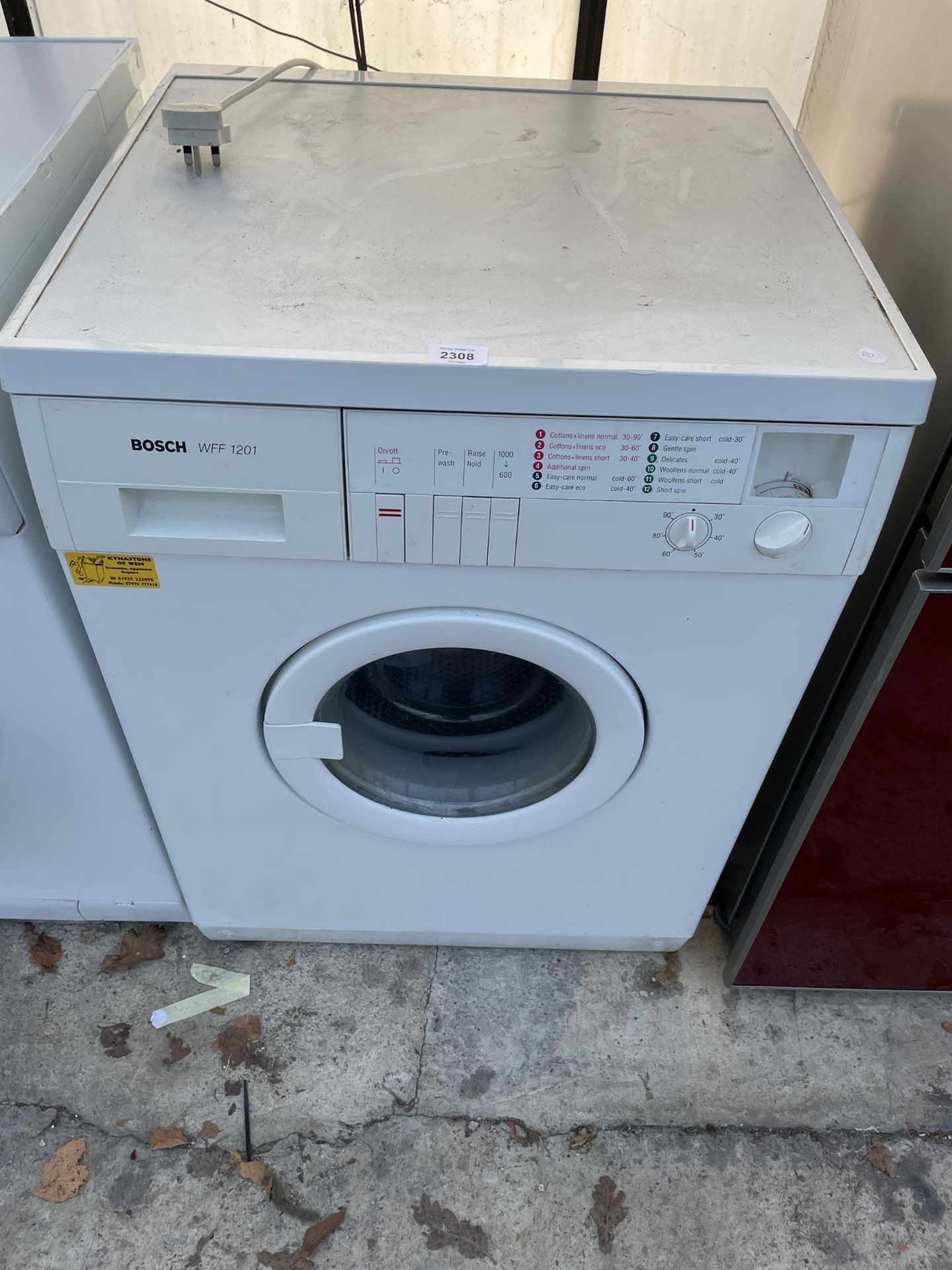 A WHITE BOSCH WFF1201 WASHING MACHINE