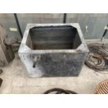 A VINTAGE GLAVANISED WATER TROUGH PLANTER