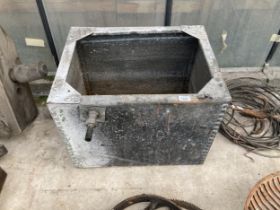 A VINTAGE GLAVANISED WATER TROUGH PLANTER