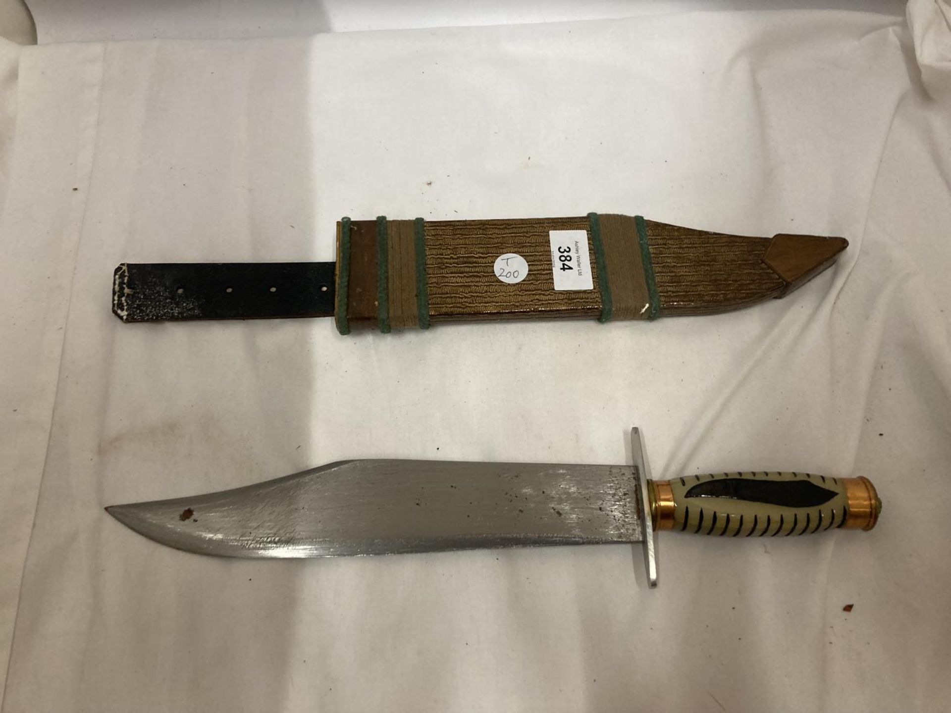 A BOWIE KNIFE AND SCABBARD WITH 26.5CM BLADE