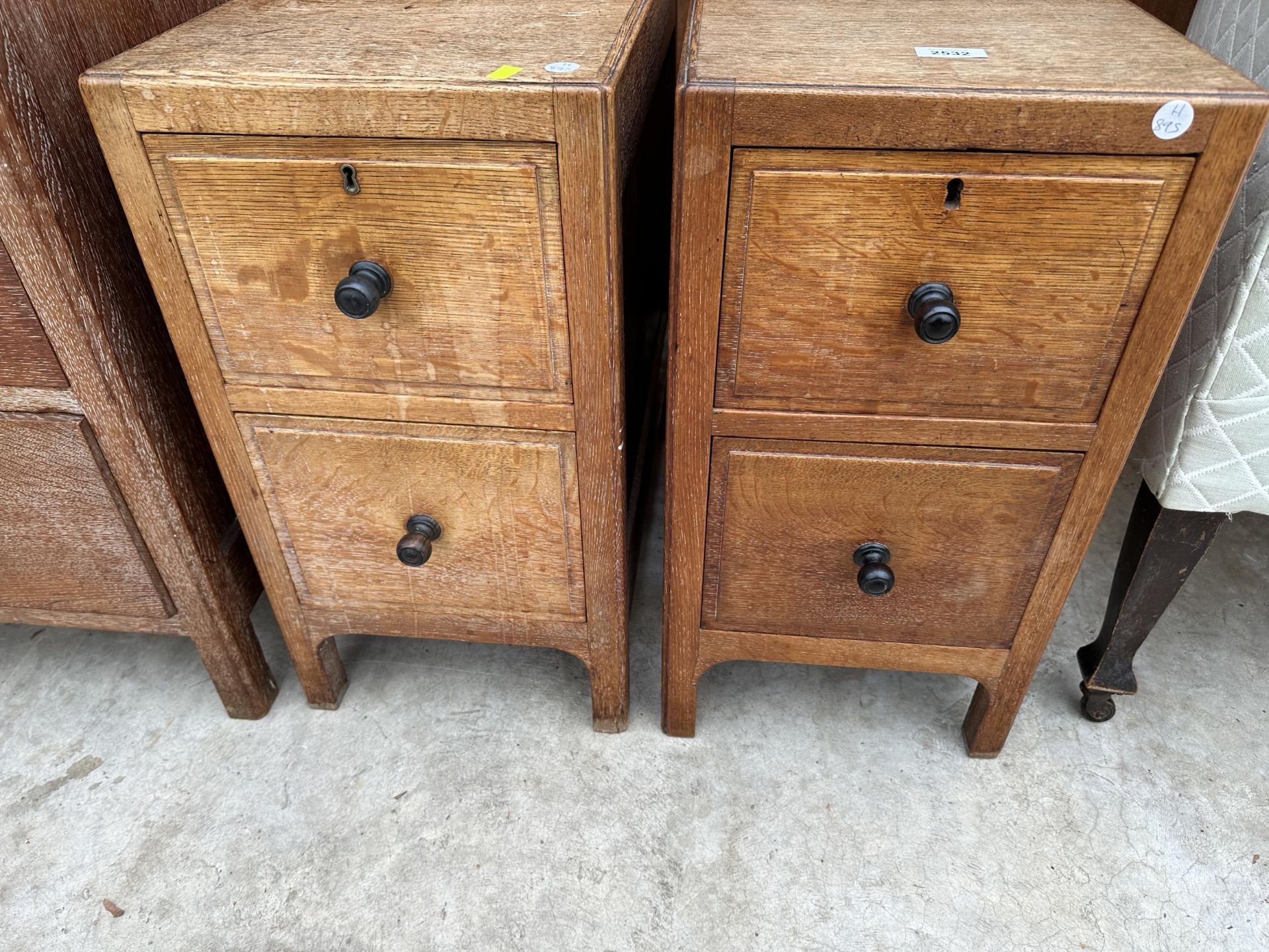 A PAIR OF HEAL AND SON (LONDON) LIMED OAK TWO DRAWER BEDSIDE CHEST WITH EBONISED KNOBS, PLEASE - Image 3 of 5