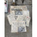 AN ASSORTMENT OF VINTAGE NEWSPAPERS