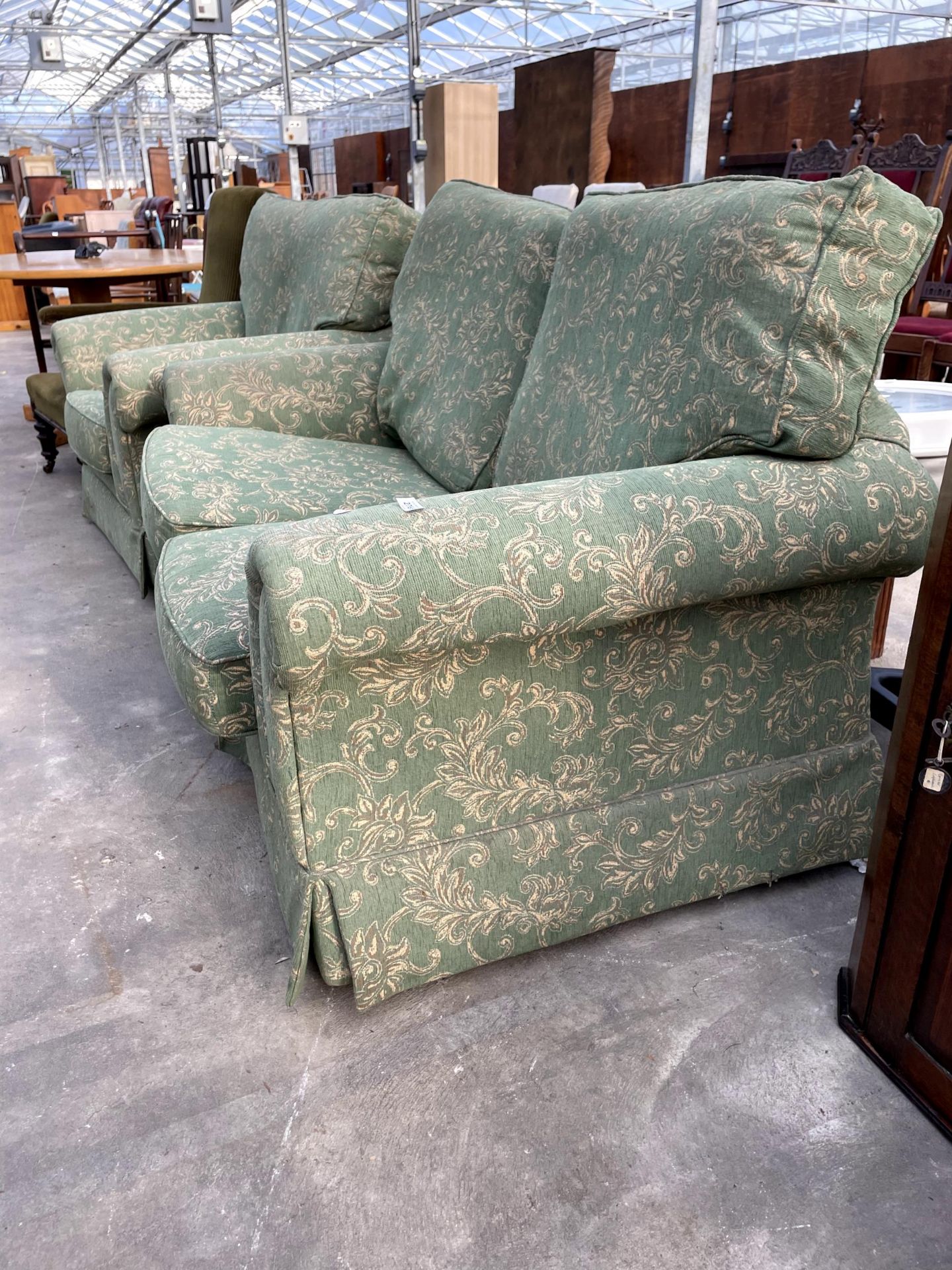 A MODERN GREEN FLORAL ADVANCE TWO SEATER SETTEE AND MATCHING EASY CHAIR - Image 2 of 2