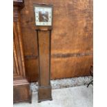 A WALNUT ART DECO GRANDMOTHER CLOCK WITH EBONISED DECORATION