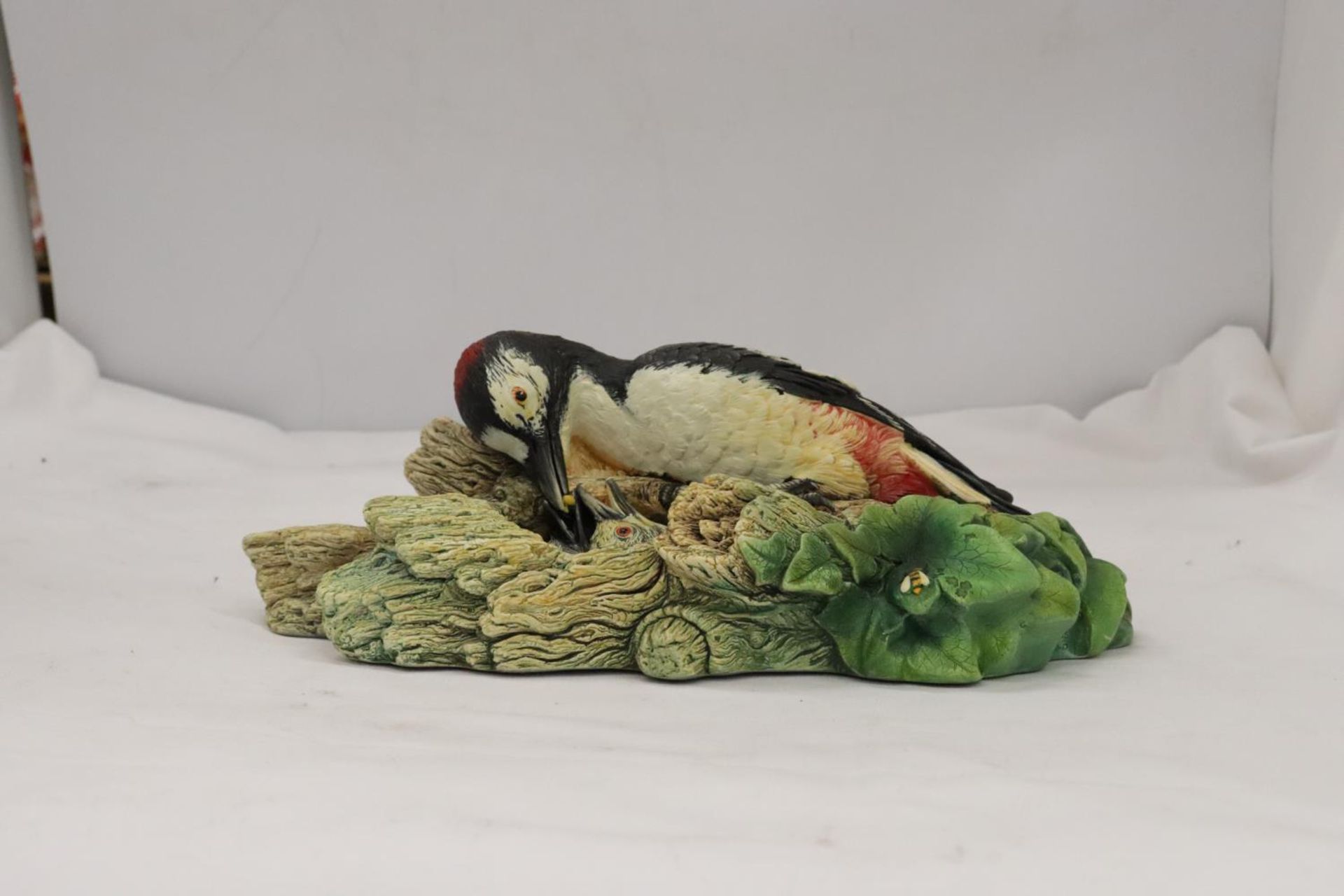 A BOSSUN'S WALL HANGING MODEL OF A WOODPECKER