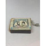 A MUSICAL MATCHBOX SEEN WORKING BUT NO WARRANTY