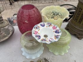 AN ASSORTMENT OF VINTAGE AND RETRO GLASS AND CERAMIC LAMP SHADES