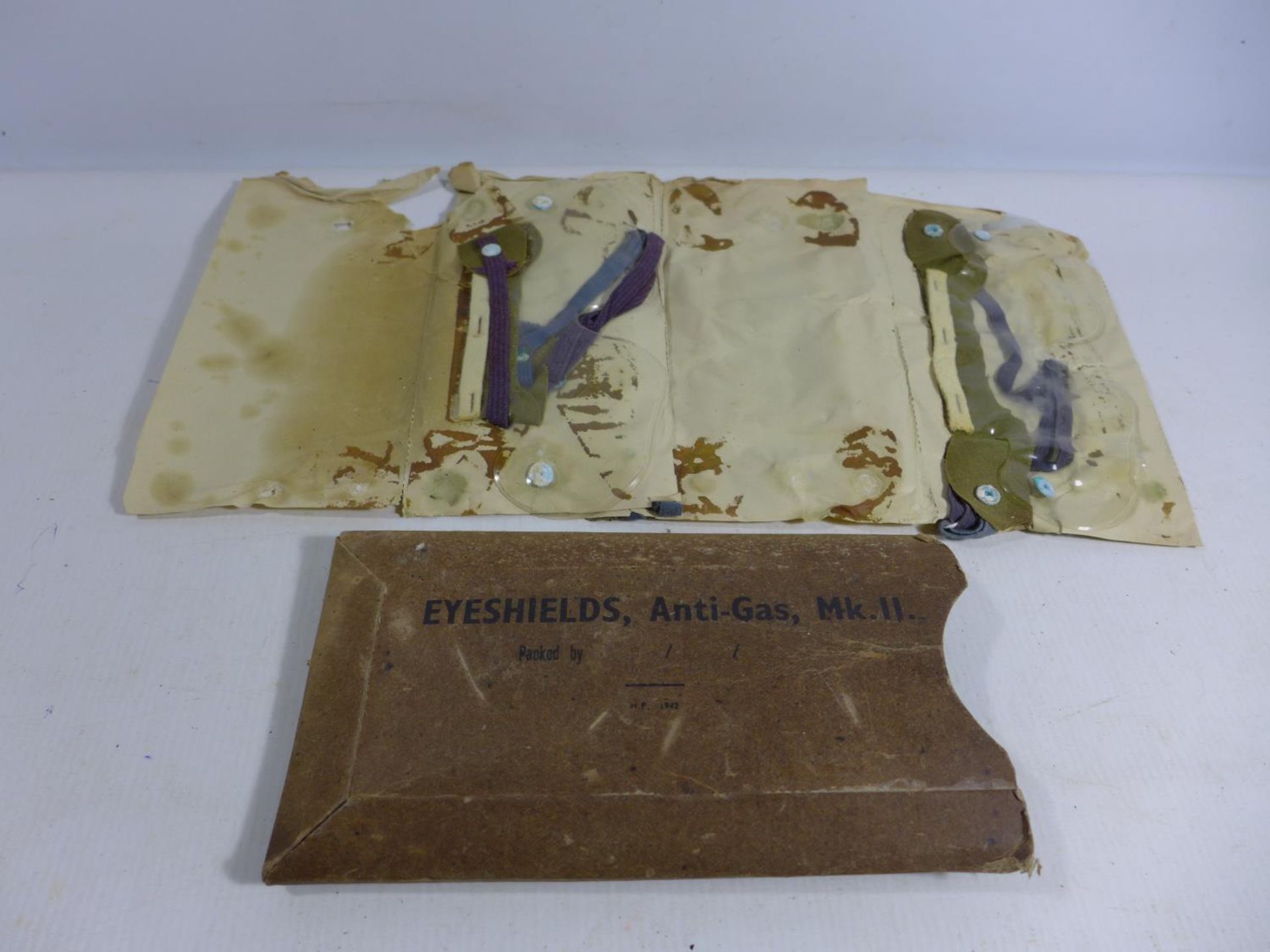 WORLD WAR II EYESHIELDS, ANTI-GAS MK II, THE PACKET CONTAINING FOUR SETS OF EYESHIELDS