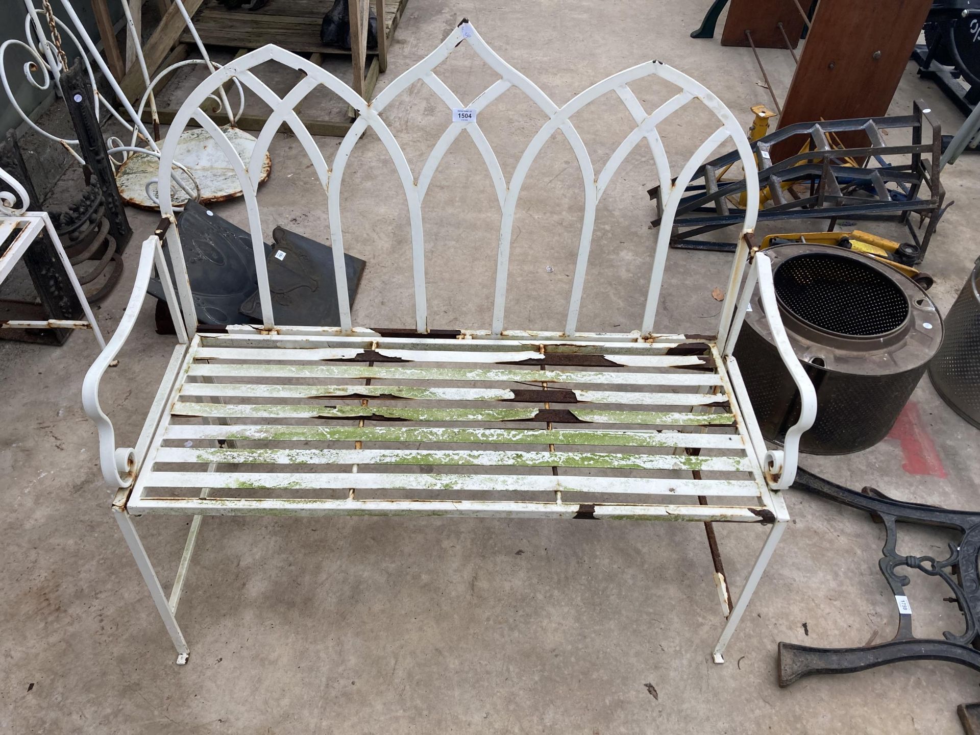 A DECORATIVE METAL TWO SEATER FOLDING GARDEN BENCH (W:104CM)