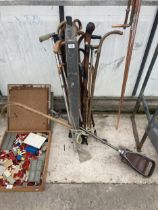 AN ASSORTMENT OF WALKING STICKS, UMBRELLAS AND SHOOTING STICKS ETC