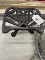 A CAST IRON TRIVET STAND