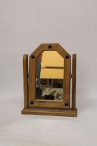 A GOTHIC STYLE, SWINGING DRESSING TABLE MIRROR