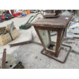 A VINTAGE CORNER WALL MOUNTED COURTYARD LIGHT FITTING WITH BRACKET (A/F GLASS)