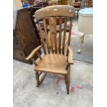 A VICTORIAN STYLE ELM AND BEECH LATH BACK ROCKING CHAIR