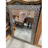 A MODERN EMBOSSED SILVER EFFECT BEVEL EDGE WALL MIRROR, 36 X 26"