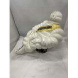 A LARGE MICHELIN MAN ADVERTISING FIGURE ON A SCREW DOWN BASEHEIGHT 39CM