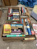 A LARGE ASSORTMENT OF BOOKS TO INCLUDE CAR MANUALS AND NOVELS ETC