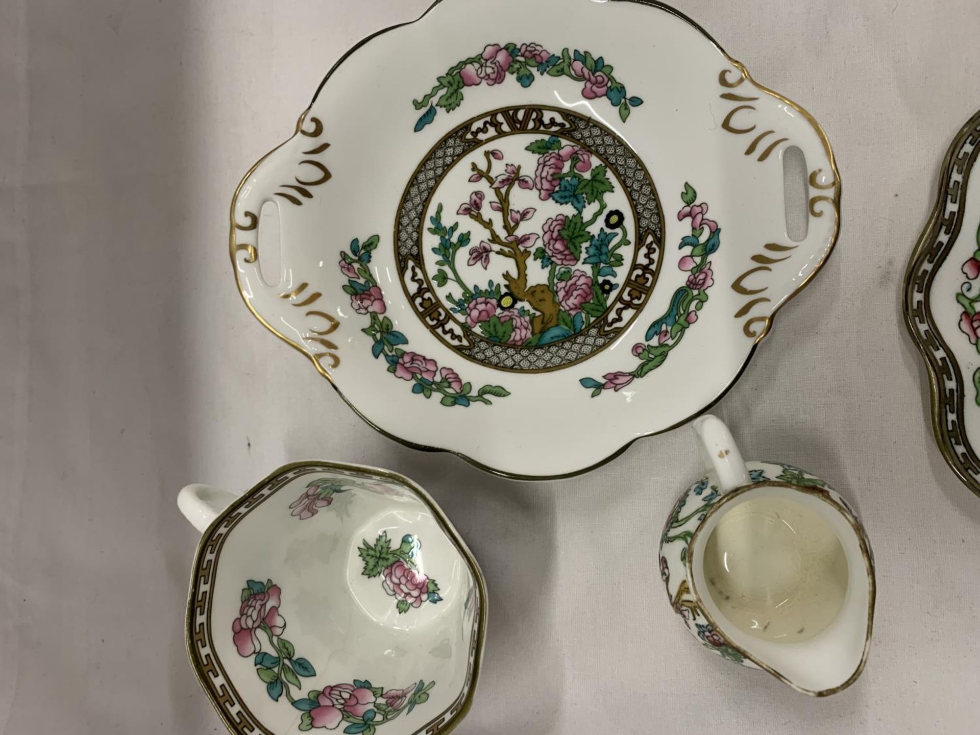 SEVEN PIECES OF COALPORT 'INDIAN TREE' DESIGN TO INCLUDE PLATES, A CUP AND CREAM JUG - Image 3 of 5