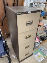 A FOUR DRAWER METAL TRIUMPH FILING CABINET