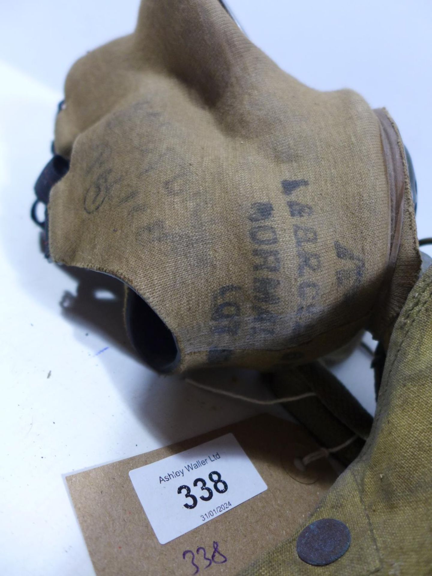 A WORLD WAR II MILITARY ISSUE GAS MASK AND BAG - Image 2 of 2