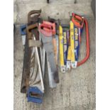 A LARGE ASSORTMENT OF VARIOUS HAND SAWS