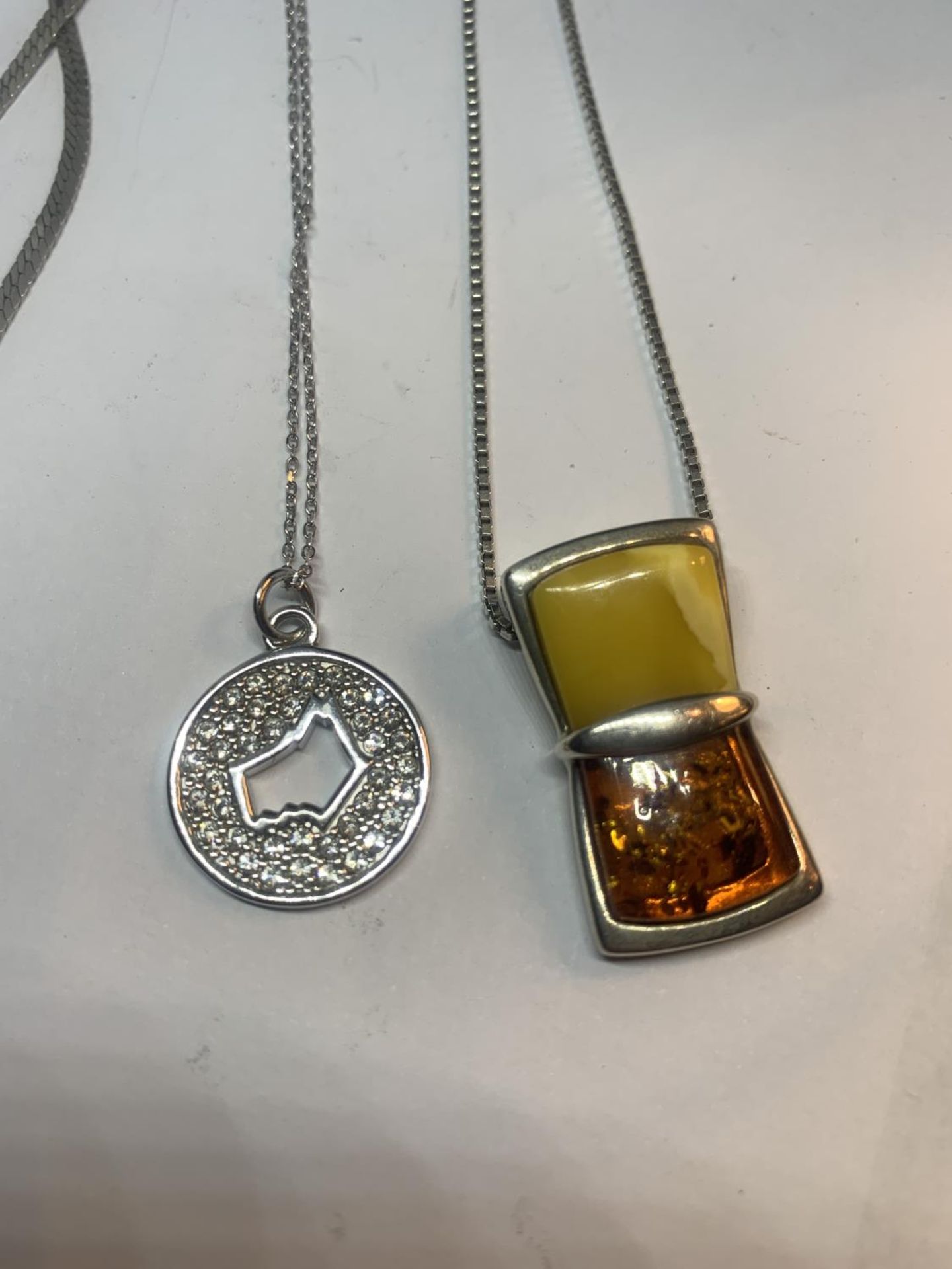 THREE SILVER NECKLACES WITH PENDANTS - Image 3 of 3
