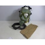 A LATE 20TH CENTURY GAS MASK, GOGGLES AND A HAT (3)