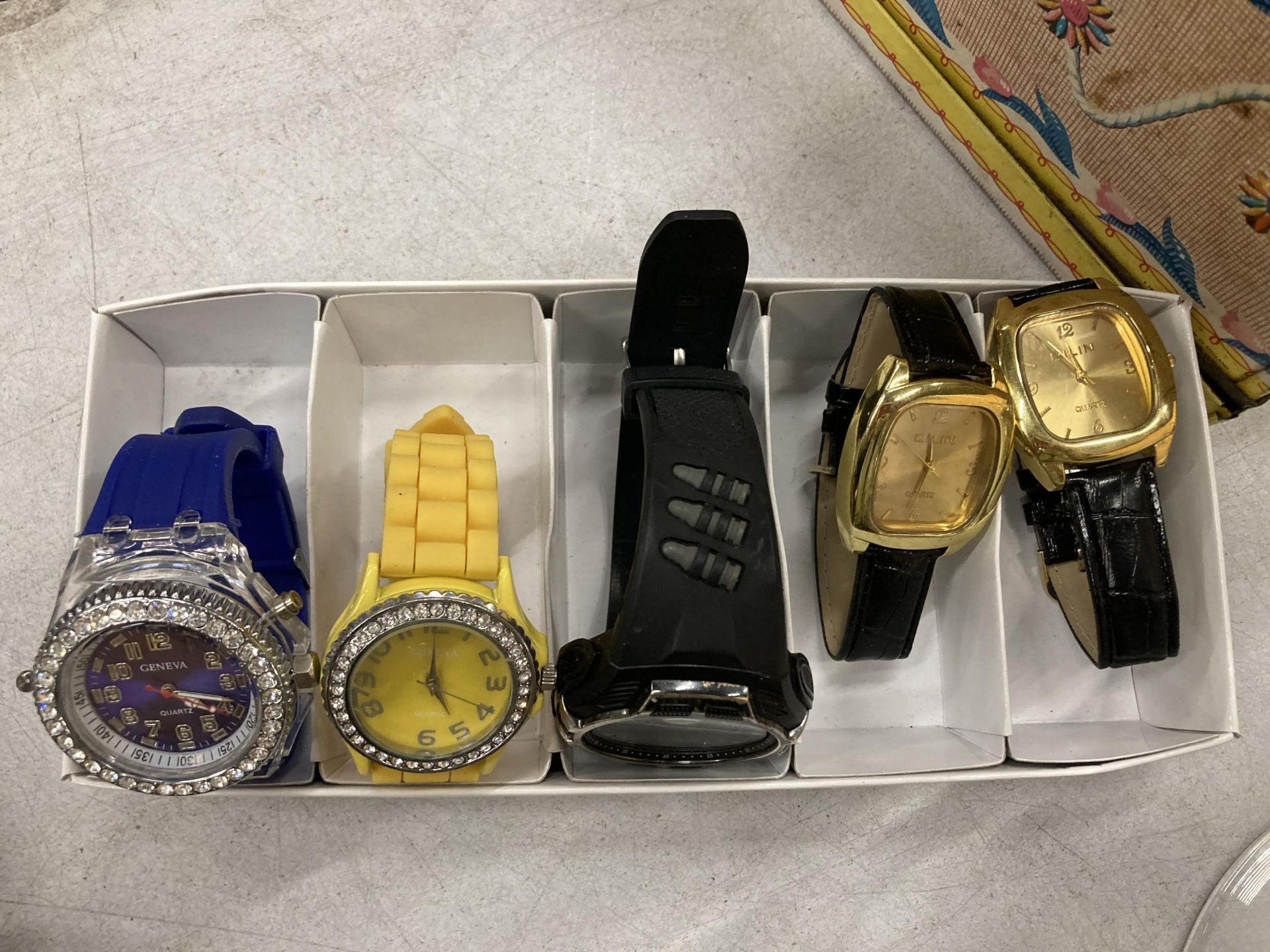 FIVE VARIOUS FASHION WATCHES