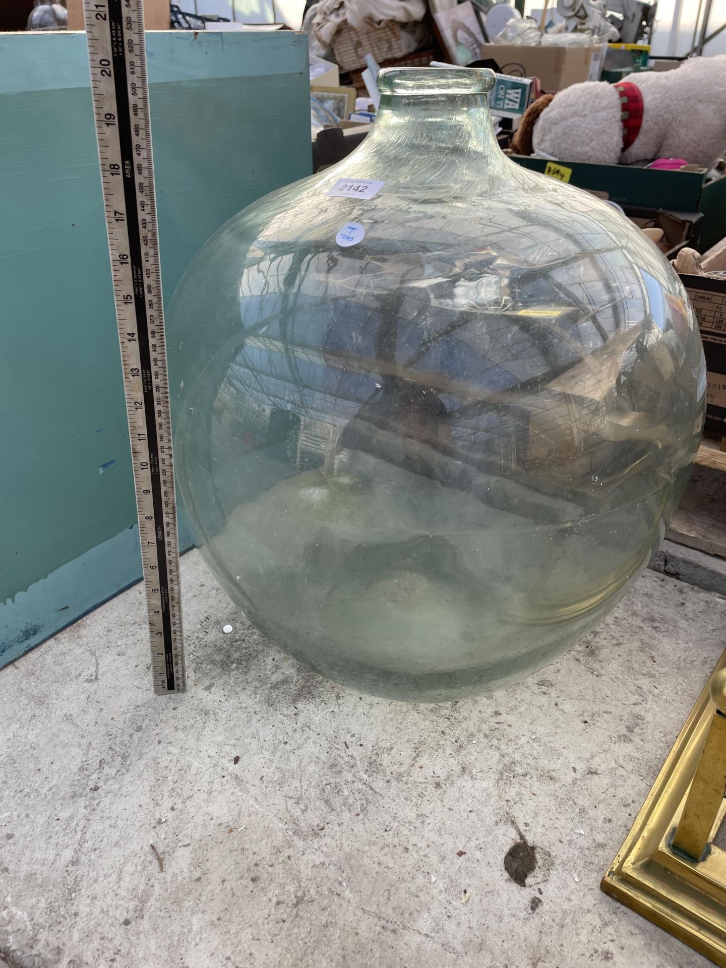 A LARGE VINTAGE GLASS CAR BOUY