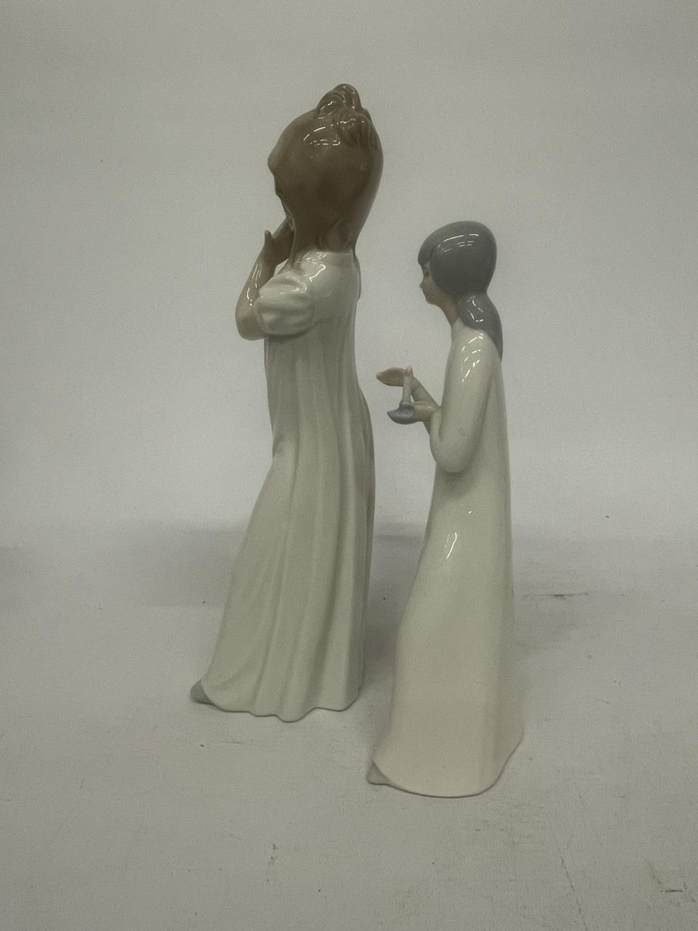 A NAO FIGURE OF A GIRL YAWNING TOGETHER WITH A MIQUEL REQUENA S.A. FIGURE OF A GIRL HOLDING A CANDLE - Image 3 of 4