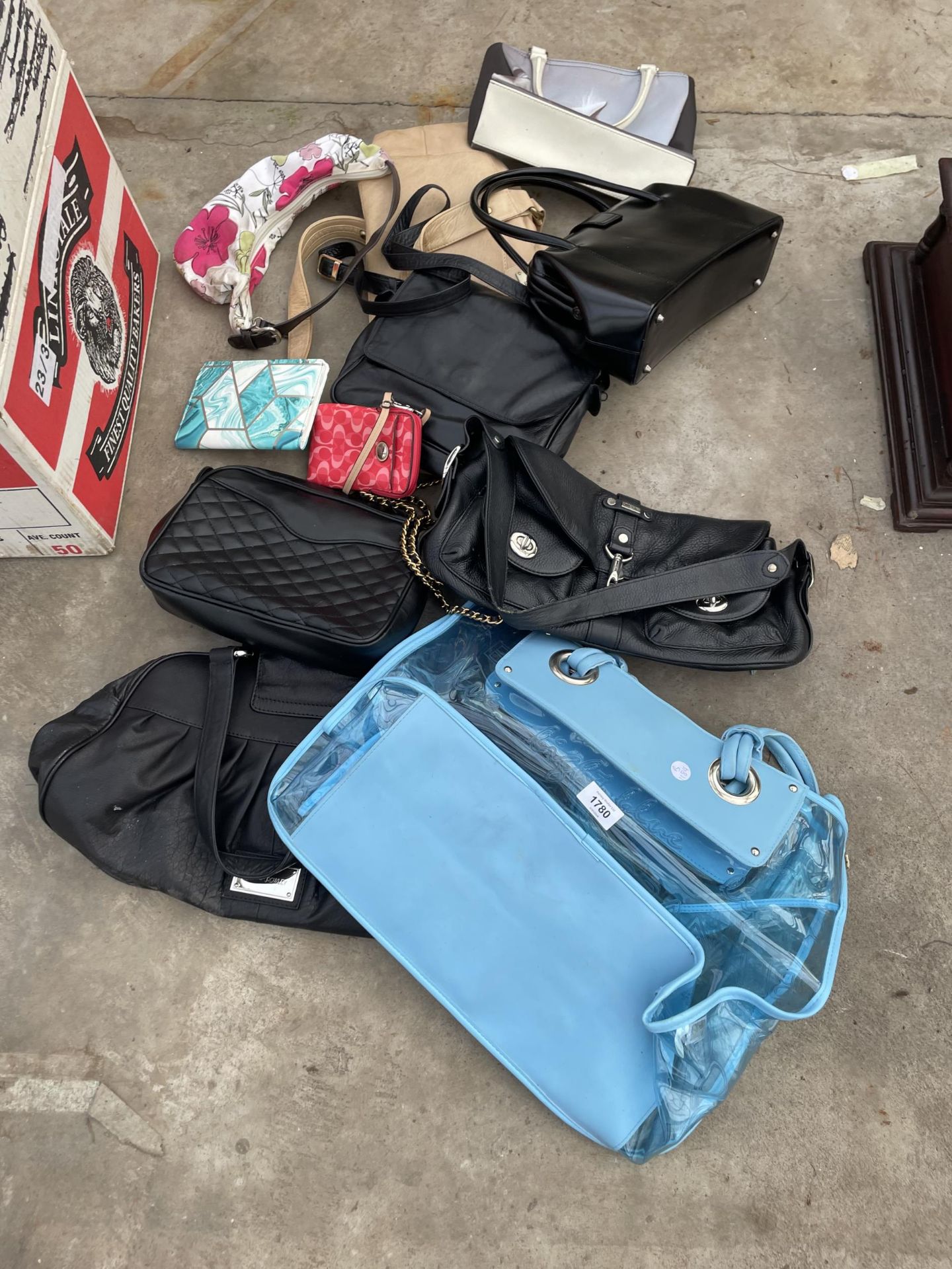 AN ASSORTMENT OF LADIES HANDBAGS