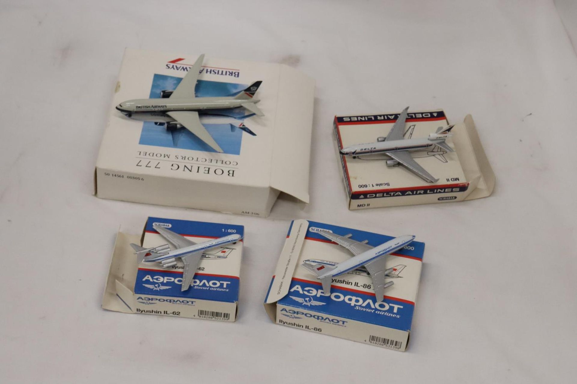 FOUR BOXED MODEL AEROPLANES