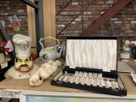 A VINTAGE KNIFE AND FORK SET, IN ORIGINAL CASE, A CHEF'S HEAD BUST, ETC