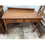 A 19TH CENTURY MAHOGANY CROSS BANDED TWO-DRAWER SIDE TABLE, 46" WIDE