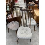 A SET OF FOUR ERCOL BLUE LABEL GOLDSMITH DINING CHAIRS
