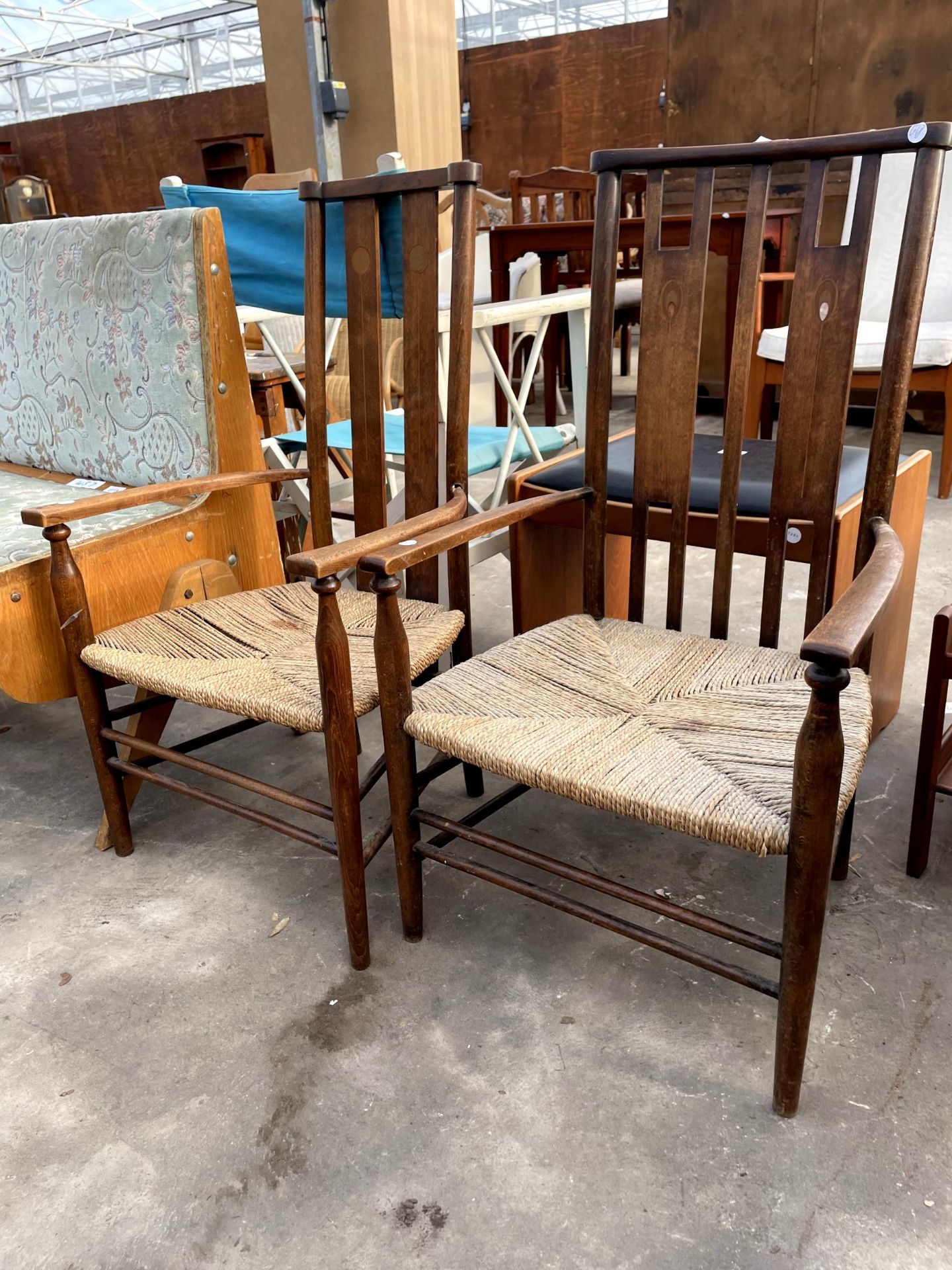 TWO ART NOUVEAU LIBERTY STYLE LOW ARMCHAIRS WITH INLAID WITH BACK PANELS AND RUSH SEATS - Image 2 of 2