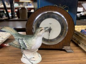 A VINTAGE SMITH'S ELECTRIC MANTLE CLOCK PLUS A CROWN STAFFORDSHIRE MODEL OF A MOCKING BIRD