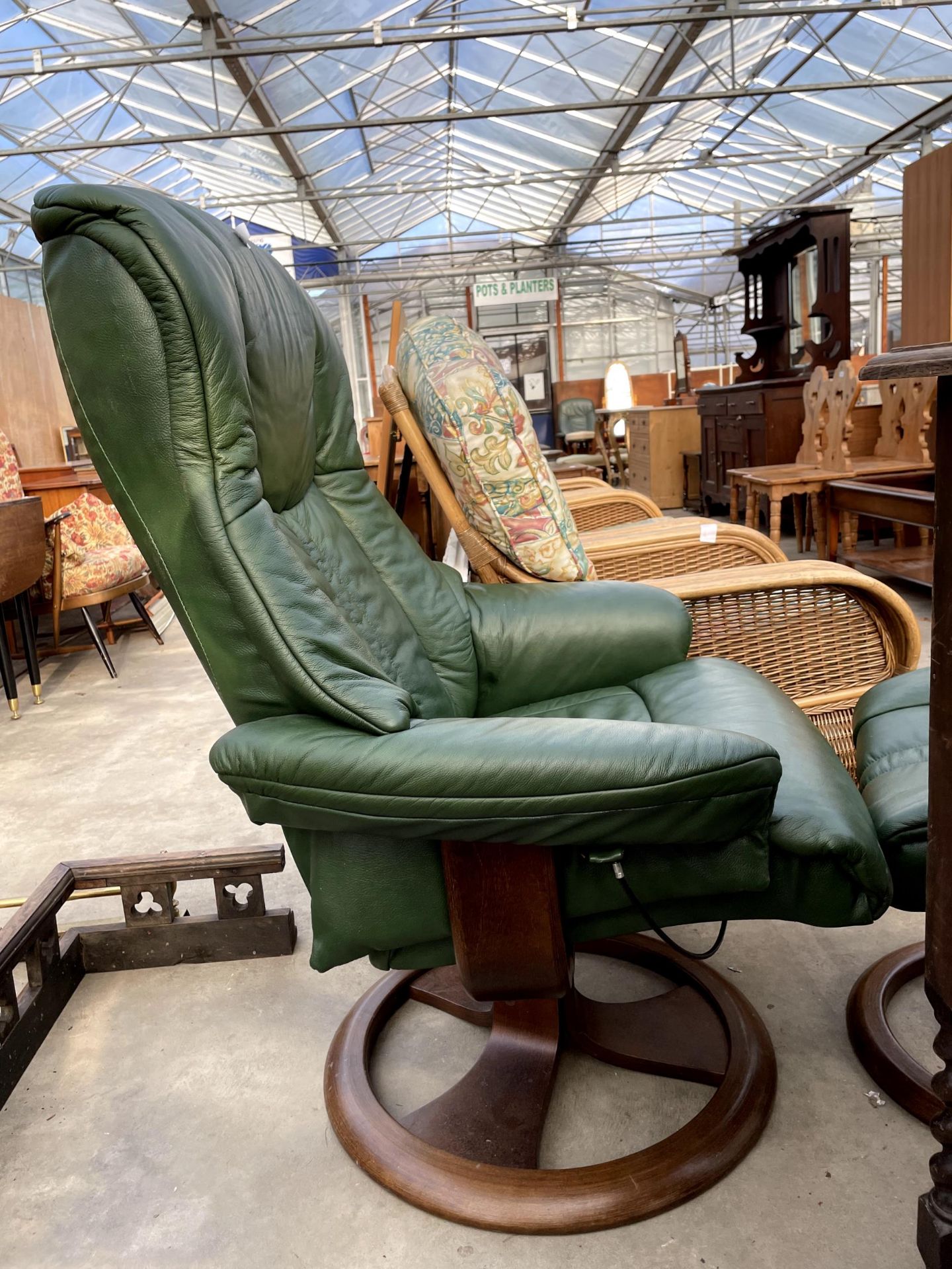 A GREEN LEATHER SWIVEL RECLINER AND STOOL - Image 3 of 3