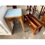 A RETRO TEAK TWO DIVISION MAGAZINE RACK AND 1950'S KITCHEN STOOL