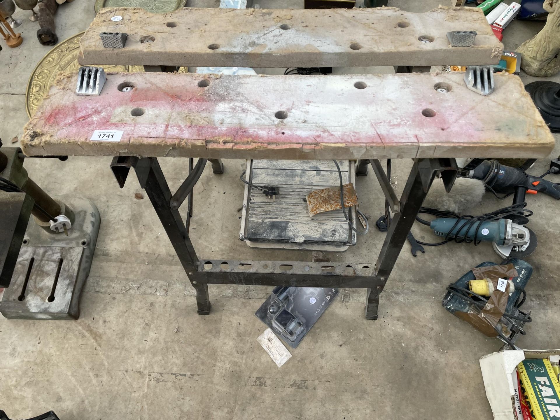 A FOLDING WORKMATE BENCH AND AN ELECTRIC TILE CUTTER