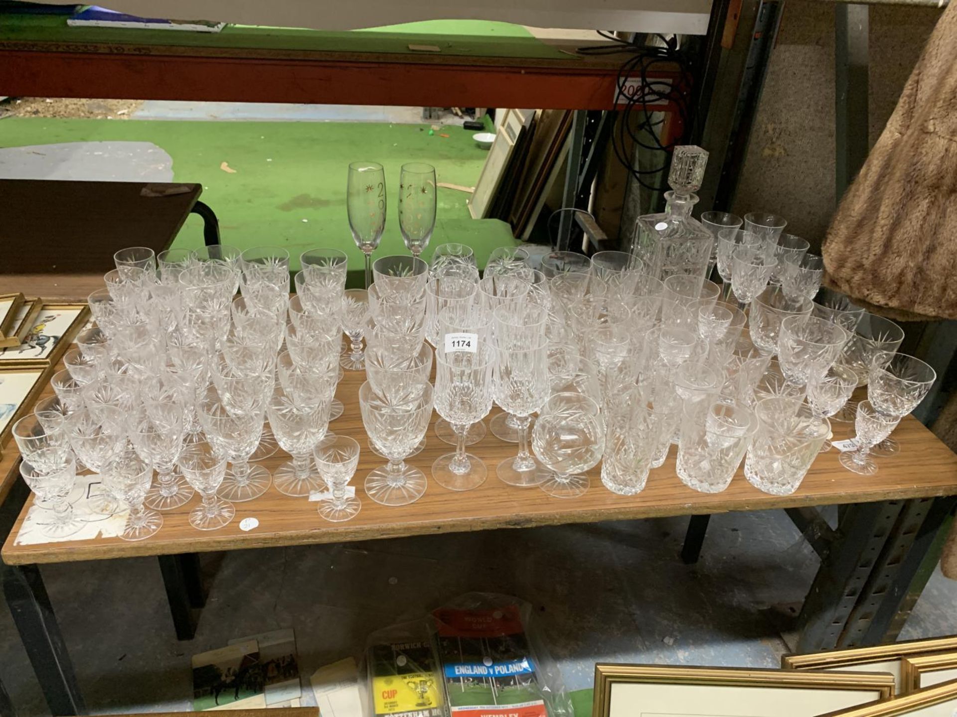 A LARGE QUANTITY OF GLASSES TO INCLUDE WINE, CHAMPAGNE FLUTES, SHERRY, BRANDY, TUMBLERS, ETC PLUS