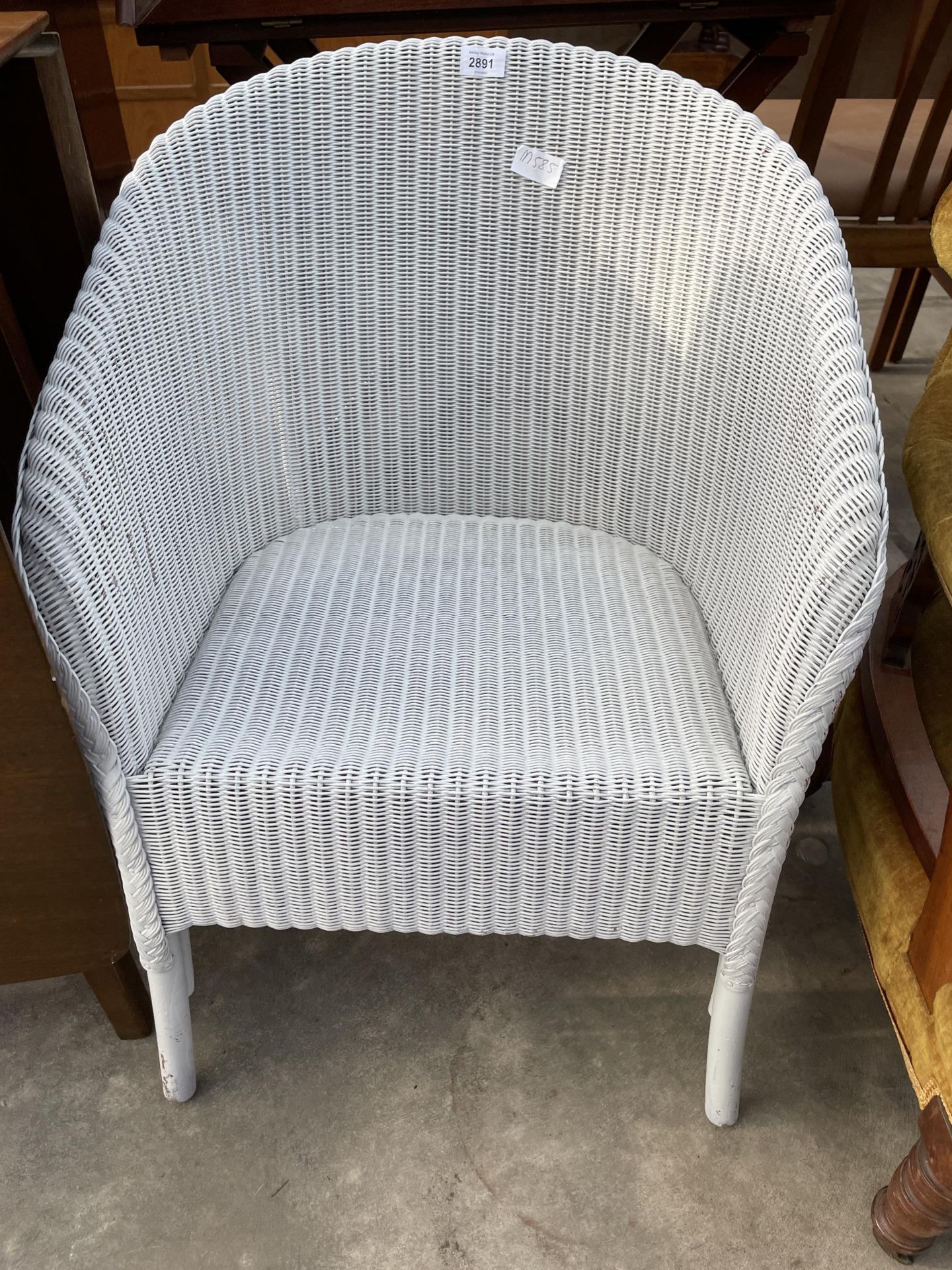 A LLOYD LOOM BEDROOM CHAIR