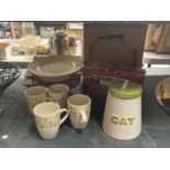 AN ASSORTMENT OF ITEMS TO INCLUDE MUGS WITH MATCHING PLATES, A BUS TIN ETC